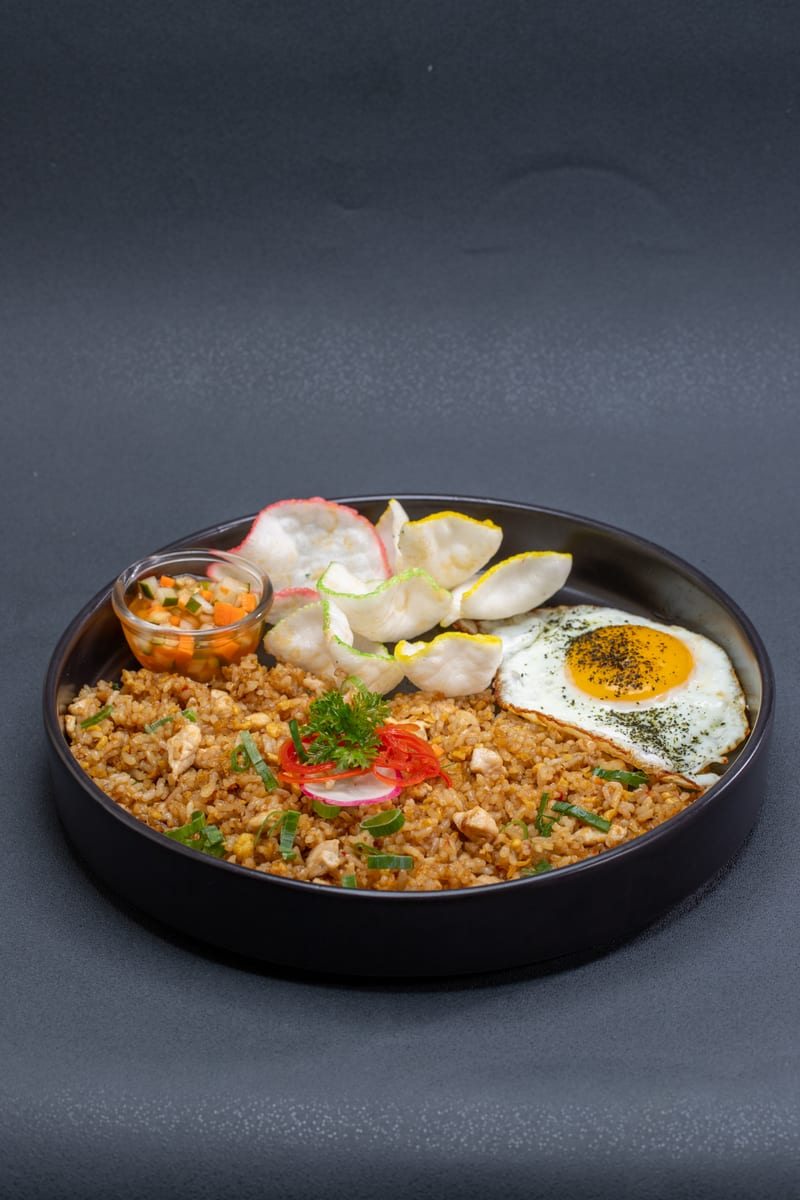 Fried rice topped with a fried egg