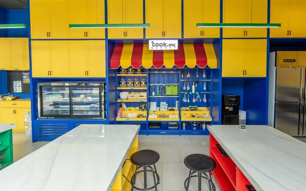 The cook.inc counter under its red and yellow awning